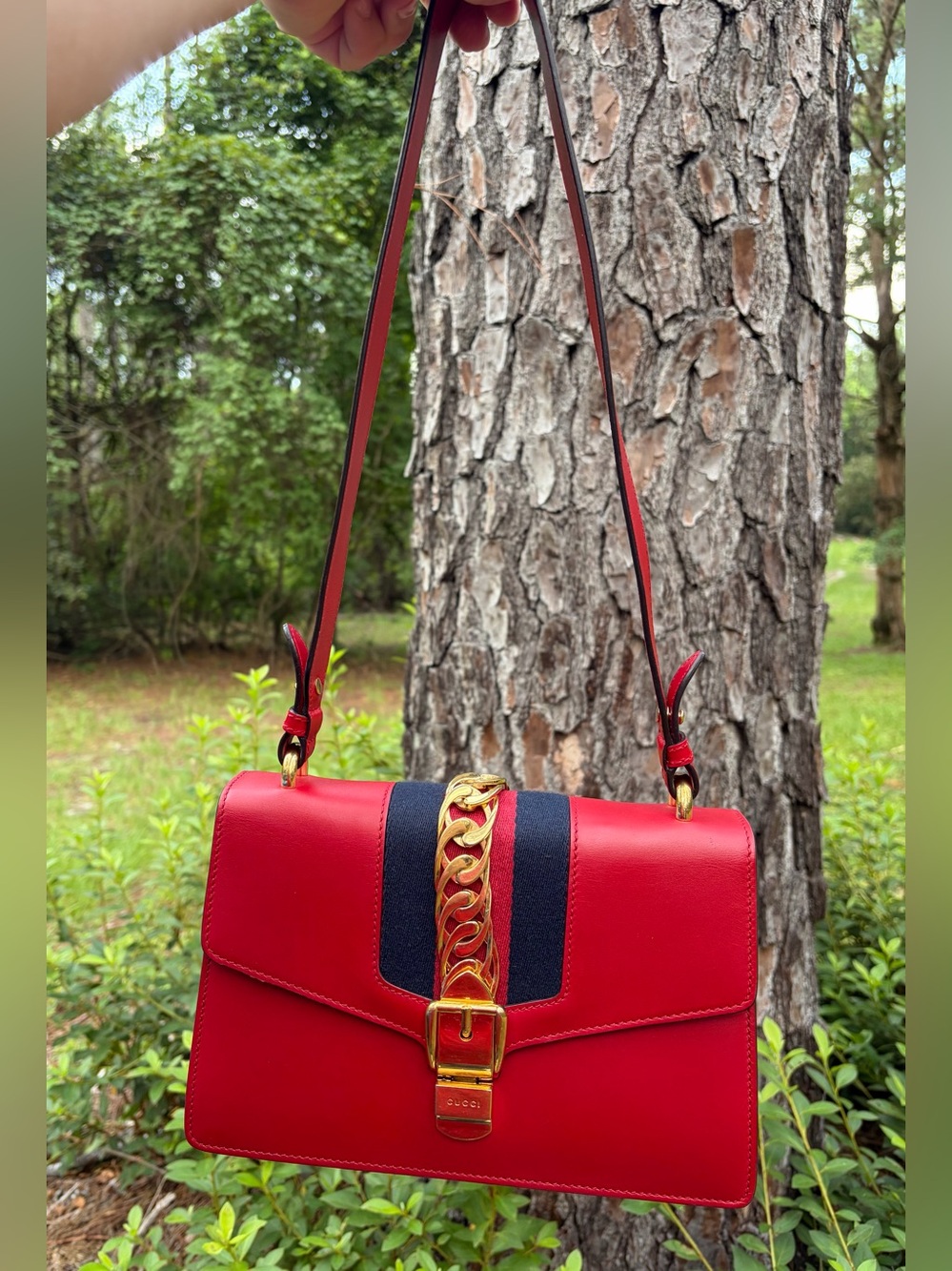 Gucci Sylvie small red shoulder bag, web stripe with gold hardware